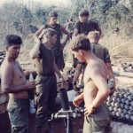 Mortar crew starting fire mission. Bu Gia Map, Vietnam 1969