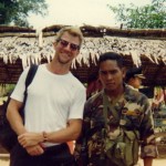 Carl with anxious Cambodian soldier. Angkor Wat, Cambodia, 1995