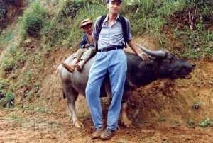 Medic with child and water buffalo. Angkor Wat, Cambodia, 1995