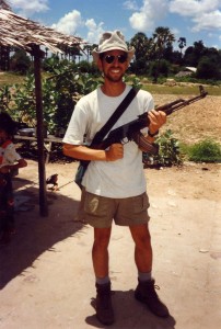 Seth at firing range. Sixty bullets purchBullets purchased at local market for five dollars. Near Phnom Penh, Cambodia, 1995
