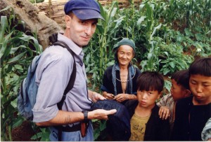 Medic in cornfield with woman and children, Sapa, 1995
