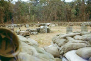 With mule and generator in foreground, view of east perimeter where sappers hit fourth platoon, then over ran the base. LZ Ranch, Snoul, Cambodia 1970 Photo: Mike Paestella
