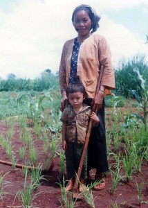 Mother and son farming on Quan Loi, a major American base during the war. Quan Loi, Vietnam 1995