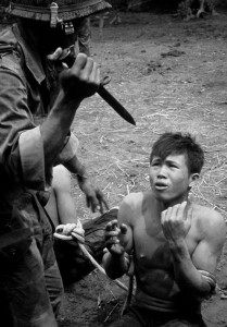 South Vietnamese soldier interogating Viet Cong prisoner. 1967