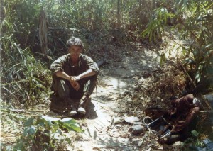 Doc Levy sitting on a well used trail